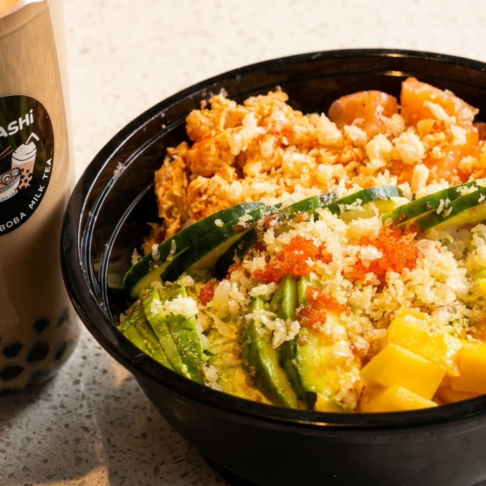 Subarashi poke bowl with salmon, avocado, mango, edamame, and boba milk tea.